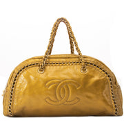 chanel gold patent leather bowling bag now for sale at labellov vintage fashion webshop belgium