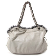 chanel tweed lambskin drawstring tweedy tote now for sale at labellov vintage fashion webshop belgium