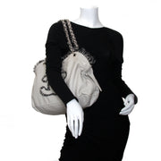chanel tweed lambskin drawstring tweedy tote now for sale at labellov vintage fashion webshop belgium