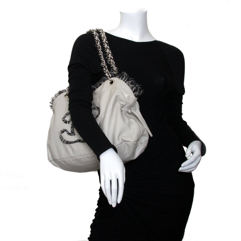 chanel tweed lambskin drawstring tweedy tote now for sale at labellov vintage fashion webshop belgium