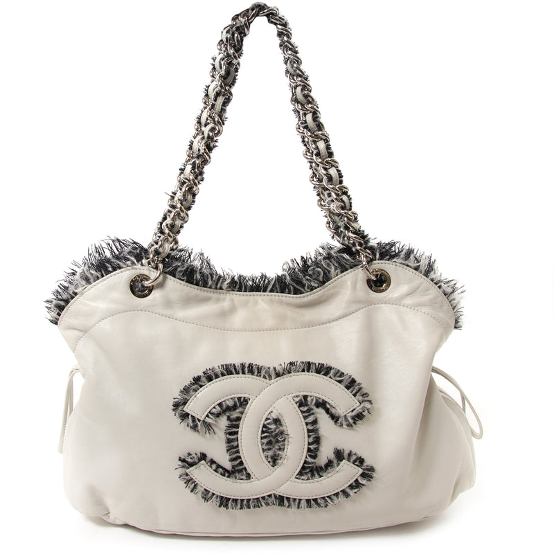 chanel tweed lambskin drawstring tweedy tote now for sale at labellov vintage fashion webshop belgium