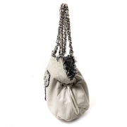 chanel tweed lambskin drawstring tweedy tote now for sale at labellov vintage fashion webshop belgium