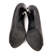 Looking for designer shoes? Chanel Black Pearl Pumps for the best price online.