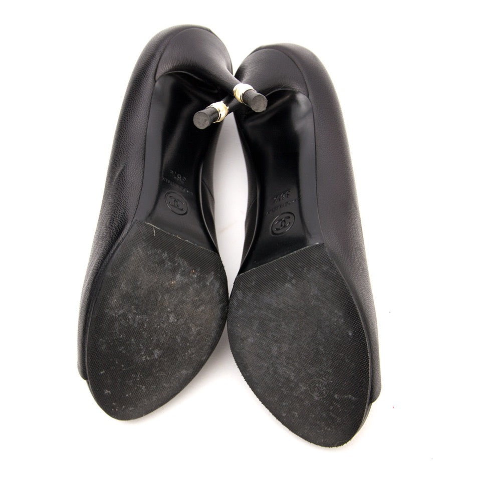 Looking for designer shoes? Chanel Black Pearl Pumps for the best price online.