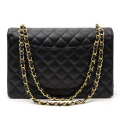 Buy the it bag Chanel Black Maxi Caviar Classic Double Flap Bag now on the website www.labellov.com or in the showroom in Antwerp, worldwide shipping from luxury goods.