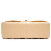 Skip the waiting list and get your Chanel Classic Flap Bag Jumbo Nude GHW at Labellov