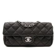 Shop luxury items in Antwerp like Chanel Black East West Flap Bag