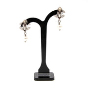 Looking for Chanel Pearl CC Clip Earrings?