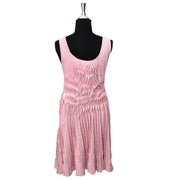 Buy an authentic secondhand Chanel Soft Pink Woolen Dress at the right price at LabelLOV vintage webshop. Safe and secure online shopping.