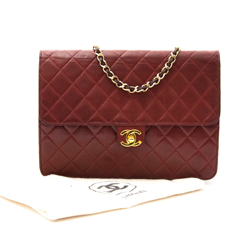 Looking for a vintage designer bag? We buy and sell your burgundy Chanel bags.