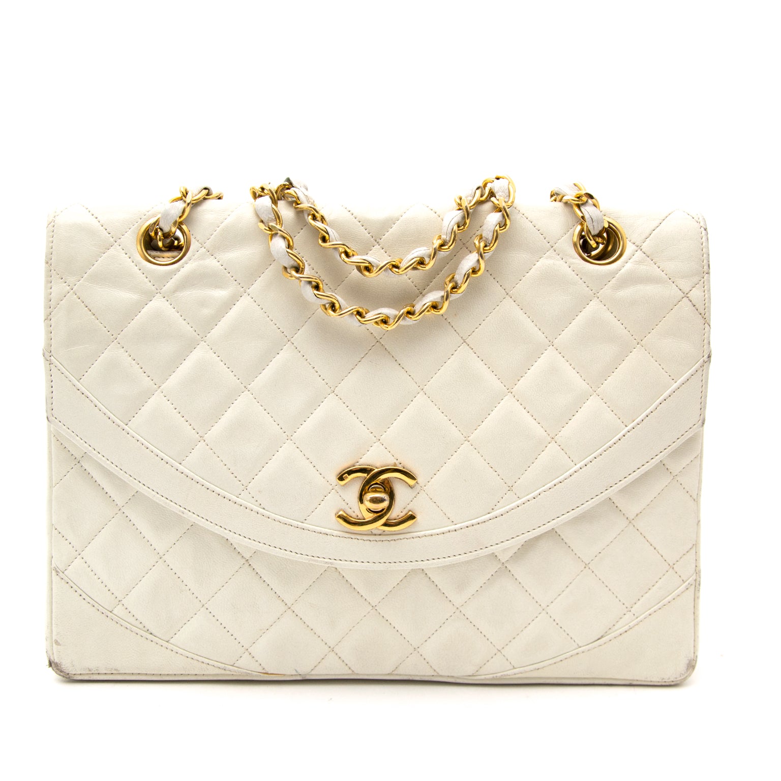 Buy this authentic Chanel White Vintage Flapbag at labellov.com