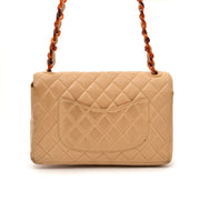 Looking for a designer bag? Buy your Chanel Classic Flap Bag Nude with Tortoise Details