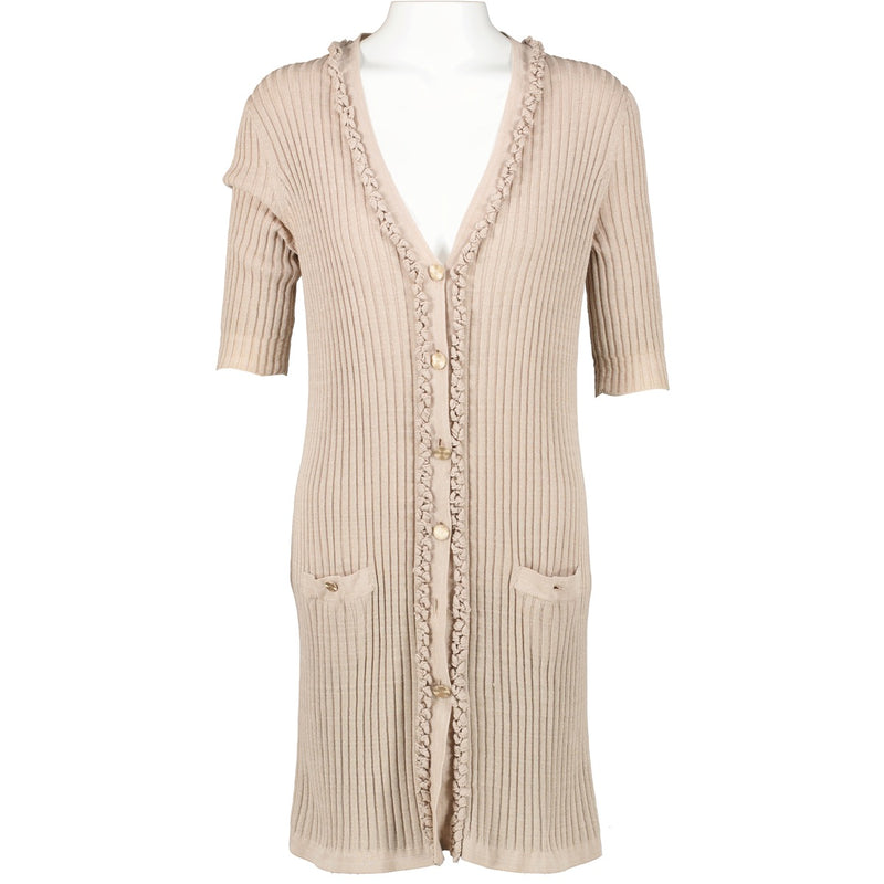 Buy online an authentic second hand Chanel Spring 2009 Beige Cardigan Dress in very good condition at Labellov in Antwerp.