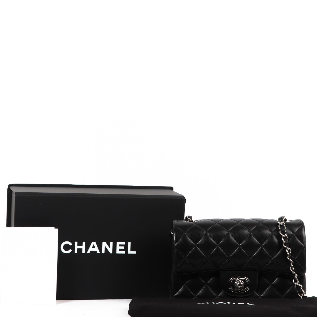 Buy an authentic Chanel Black Lambskin Classic Mini Flap Bag in excellent condition at Labellov in Antwerp.
