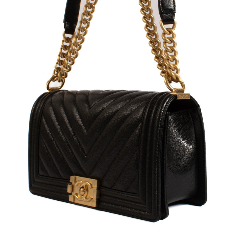 Authentic second hand brand new Chanel Black Shiny Caviar Calfskin Chevron Medium Boy Bag on www.labellov.com