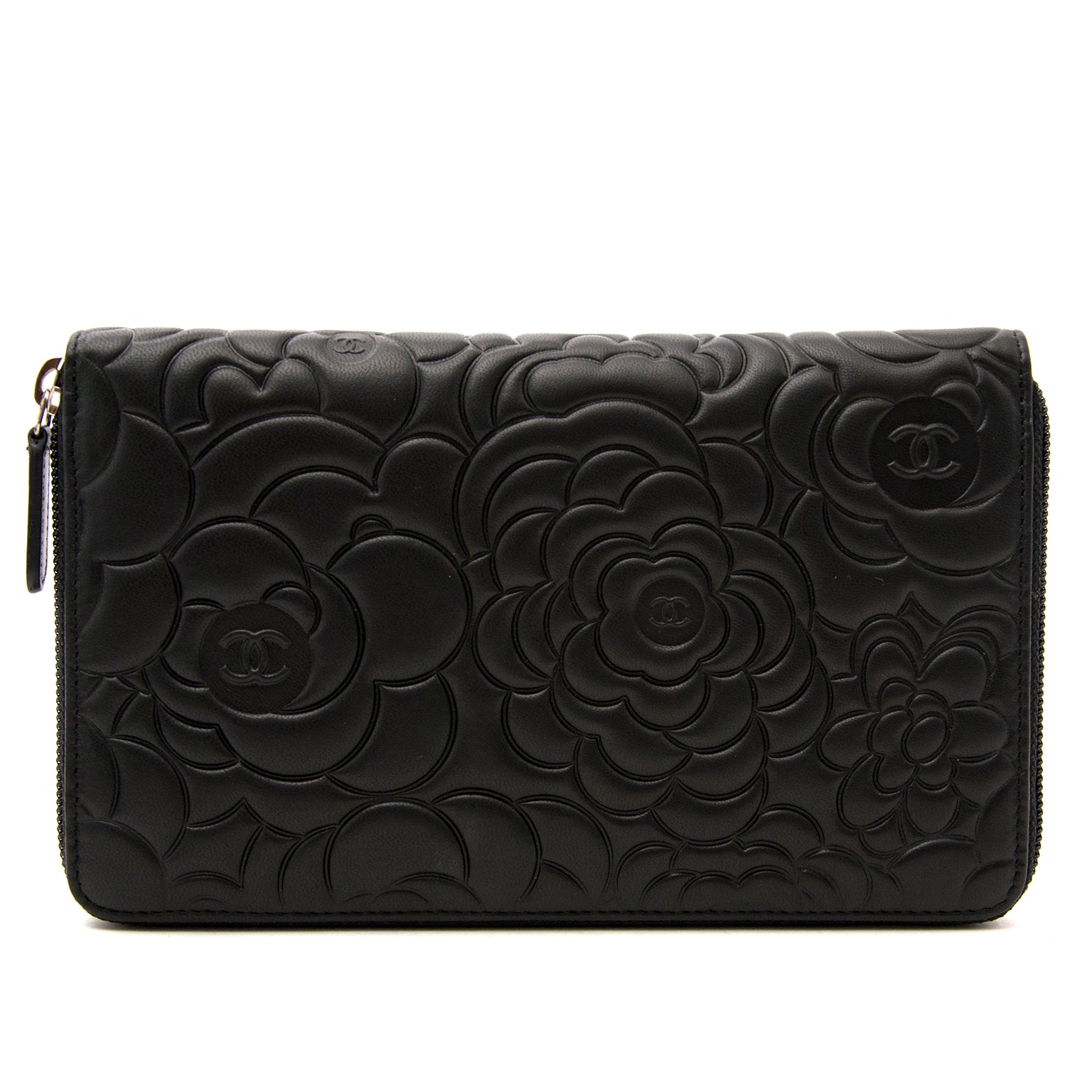 We buy and sell your timeless luxury bags and clutches such as this Chanel black leathet camelia clutch