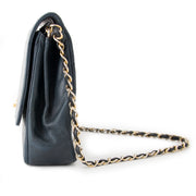 Buy authentic Chanel flap bag at the right price at LabelLOV vintage webshop. Luxe, vintage, fashion. Safe and secure online shopping. Antwerp, Belgium.