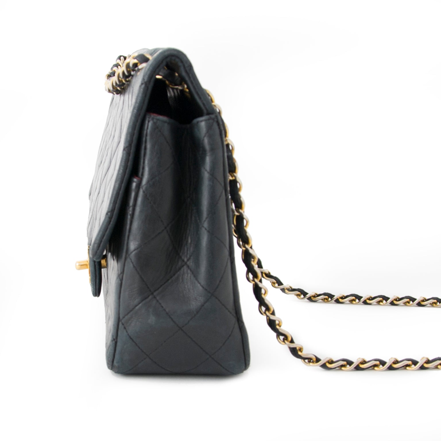 Buy authentic Chanel flap bag at the right price at LabelLOV vintage webshop. Luxe, vintage, fashion. Safe and secure online shopping. Antwerp, Belgium.