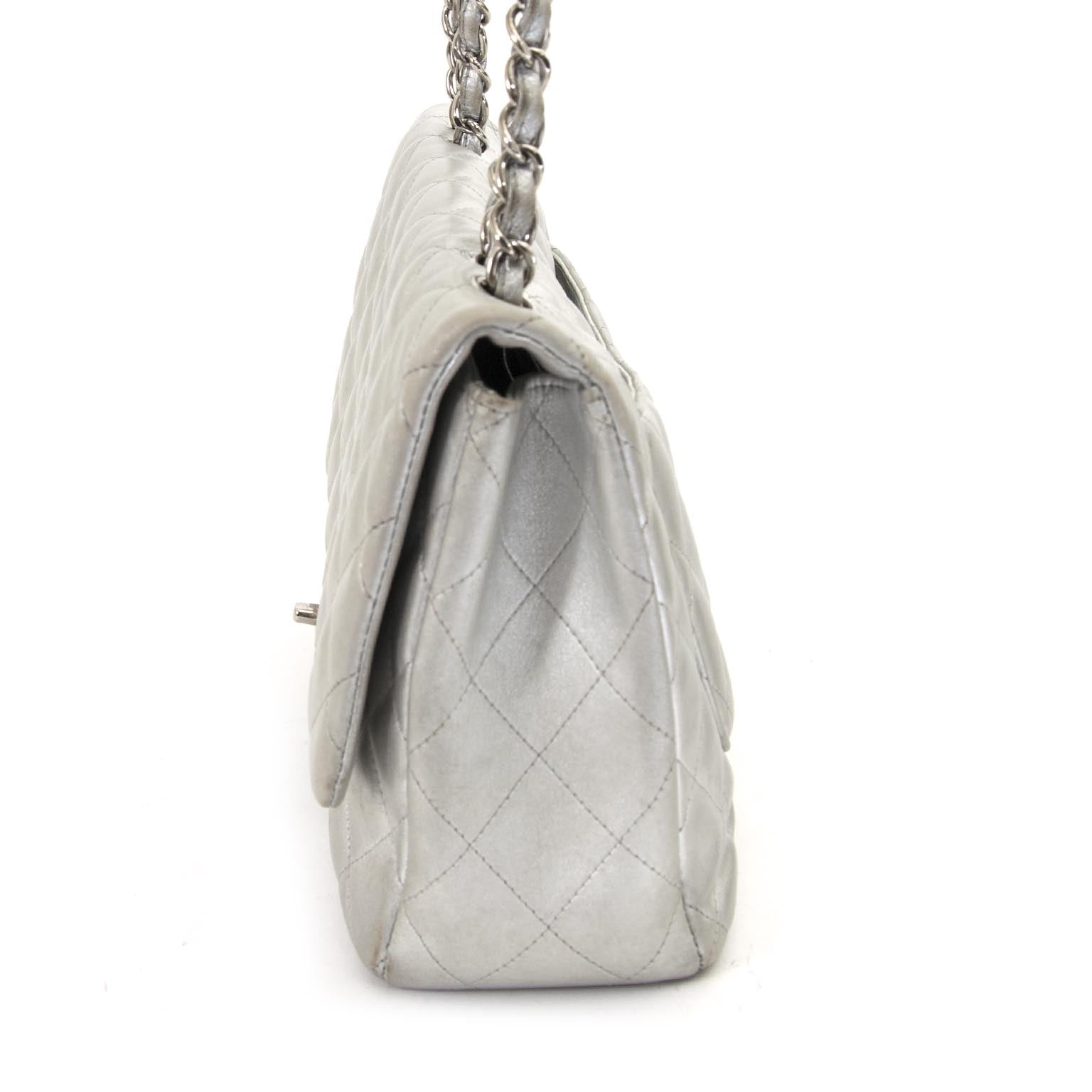 Chanel Jumbo Silver Quilted Metallic Lambskin Classic Flap Bag for sale online at Labellov
