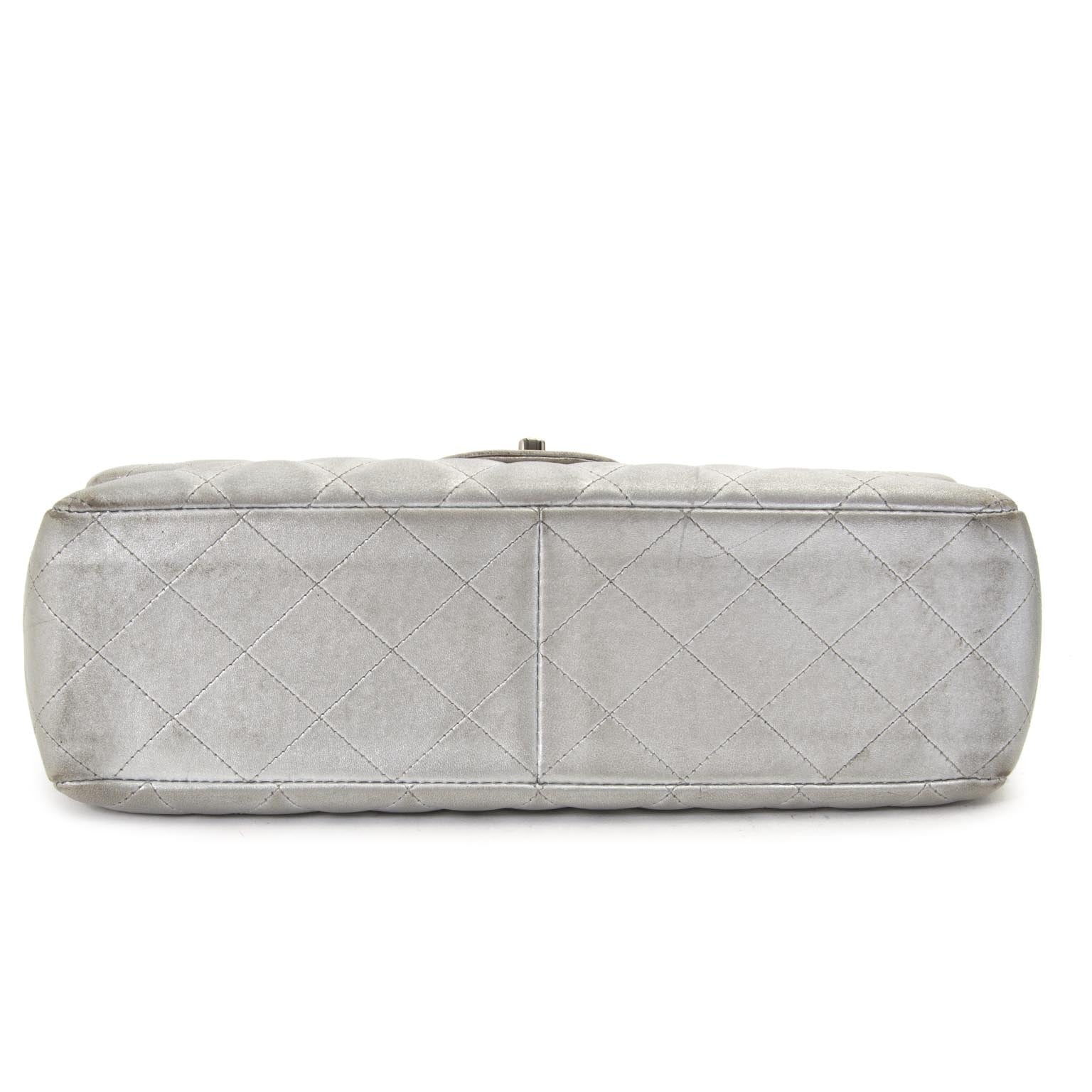 Secondhand designer bags for the best price at Labellov Chanel Jumbo Silver Quilted Metallic Lambskin Classic Flap Bag