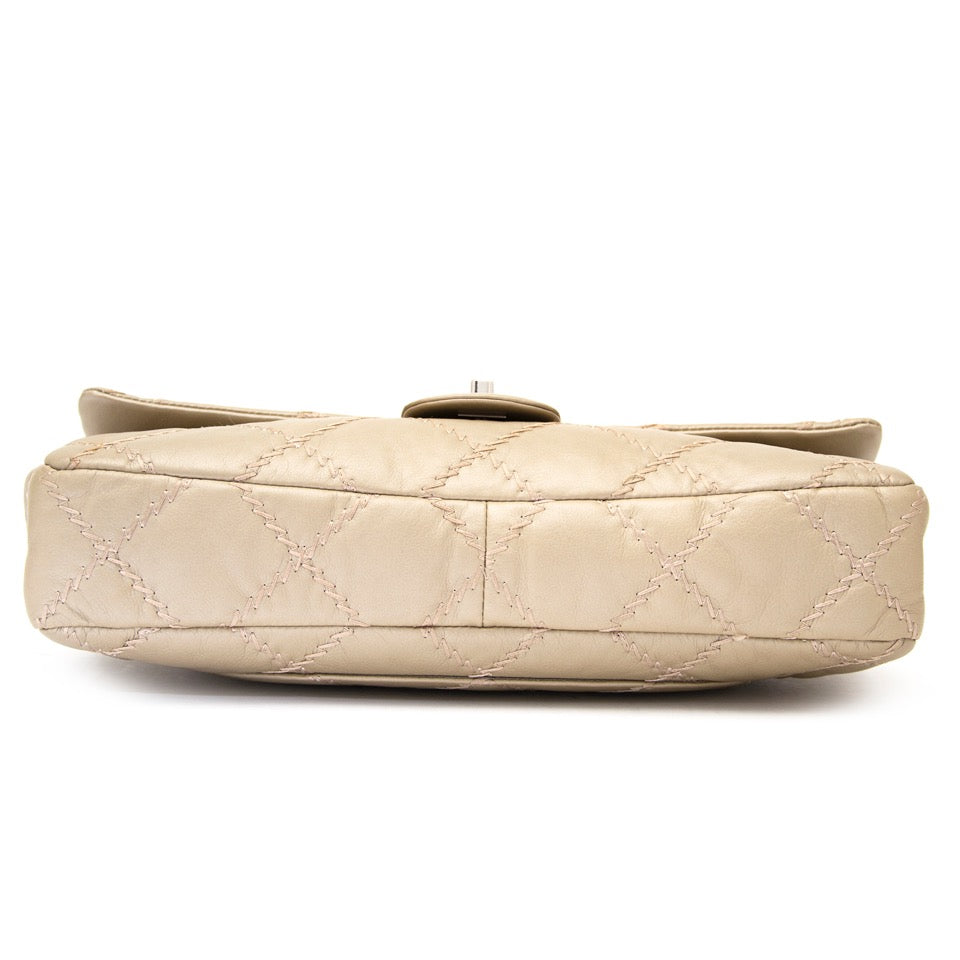Buy Vintage Chanel Gold East West Ultra Stitch Flap bag at the right price at LabelLOV vintage webshop. Luxe, vintage, fashion. Safe and secure online shopping. Antwerp, Belgium.