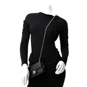 acheter en ligne pour le meilleur prix Chanel Black Extra Mini Classic Flap Bag