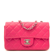 Chanel Candy Pink New Mini Classic Flap bag now online at labellov.com