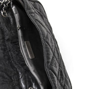 Chanel Black Glitter Jersey Flap Bag à vendre à labellov vintage webshop de mode belgique pour le prix plus bas