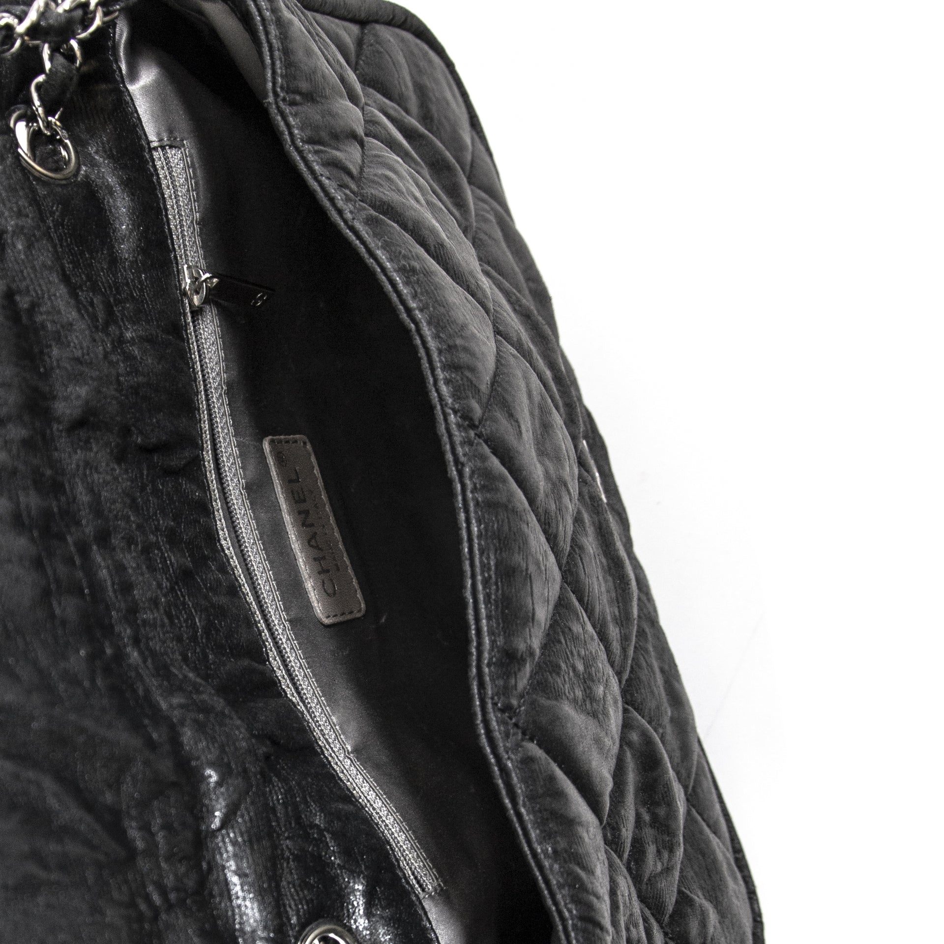 Chanel Black Glitter Jersey Flap Bag à vendre à labellov vintage webshop de mode belgique pour le prix plus bas