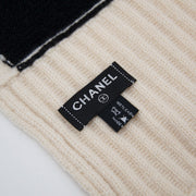 Buy Brand New DChanel cashmere scarf in navy and blue. at the right price at LabelLOV vintage webshop. Luxe, vintage, fashion. Safe and secure online shopping. Antwerp, Belgium.