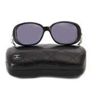 chanel black frame camellia flower sunglasses now for sale at labellov vintage fashion webshop belgium