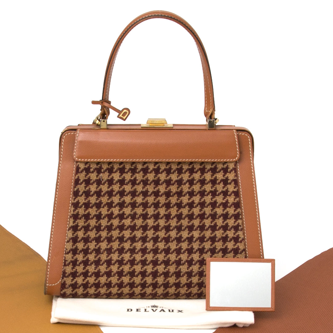 Safe and secure online vintage shopping LabelLOV Delvaux illusion handtas online tweedehands