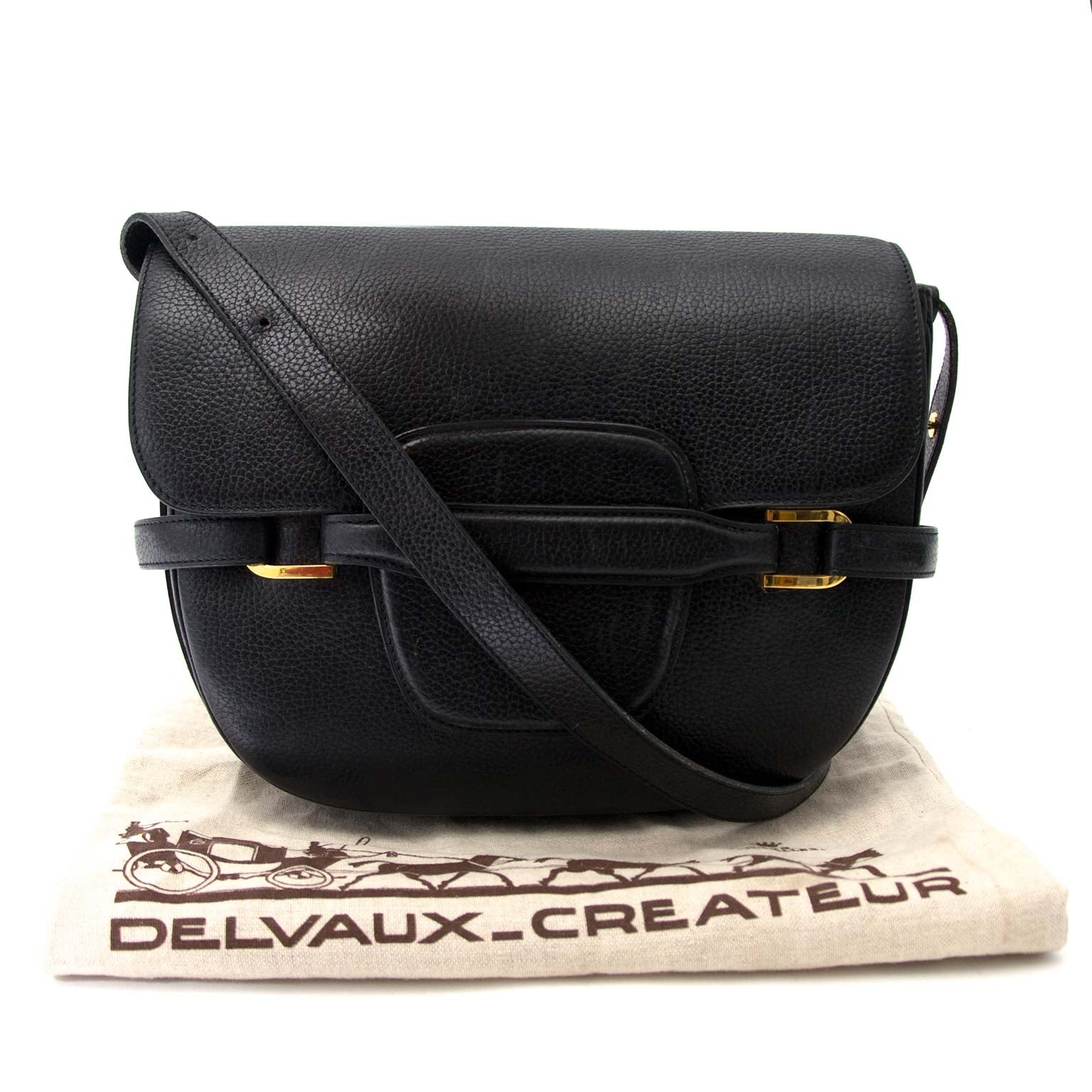 Delvaux Black Grained Leather Shoulder Bag Buy authentic designer Delvaux secondhand bags at Labellov at the best price. Safe and secure shopping. Koop tweedehands authentieke Delvaux tassen bij designer webwinkel labellov.