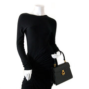 We buy and sell your authentic Delvaux Vintage Black Leather Top Handle Bag