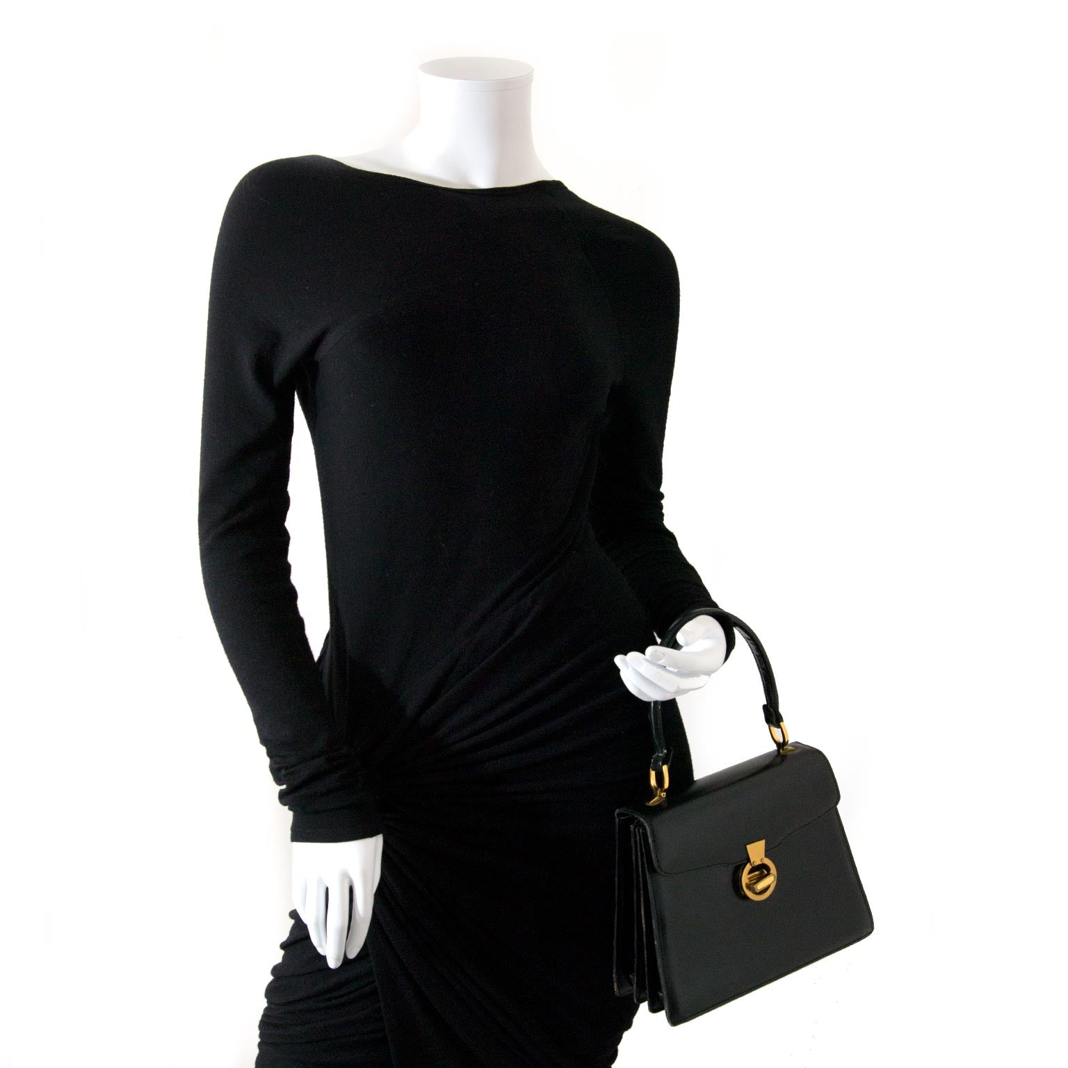 We buy and sell your authentic Delvaux Vintage Black Leather Top Handle Bag