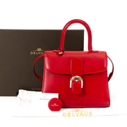 Koop en verkoop uw authentieke Delvaux Brillant MM Boxcalf Rouge Lipstick aan de beste prijs bij Labellov
