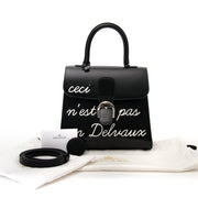Acheter en ligne chez labellov.com pour le meilleur prix Delvaux L'Humour Ceci n'est pas un delvaux
