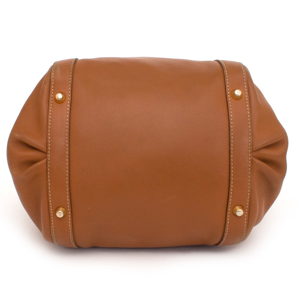 Buy Delvaux cognac top handle at the right price at LabelLOV vintage webshop. Luxe, vintage, fashion. Safe and secure online shopping. Antwerp, Belgium.
