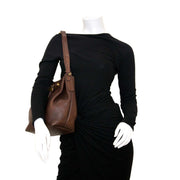 Authentic brown Delvaux handbag with drawstring at the best price at Labellov, the vintage luxury webshop.
