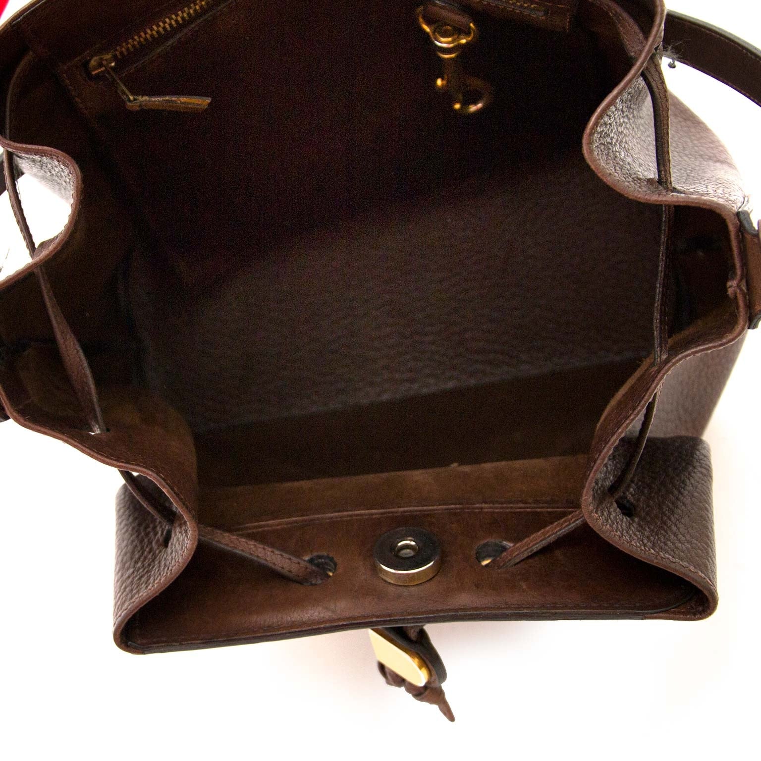 Authentieke Delvaux bruine handtas met gouden touch bij Labellov, uw vintage webshop in luxe artikelen.