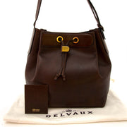 Authentic brown Delvaux handbag with drawstring at the best price at Labellov, the vintage luxury webshop.