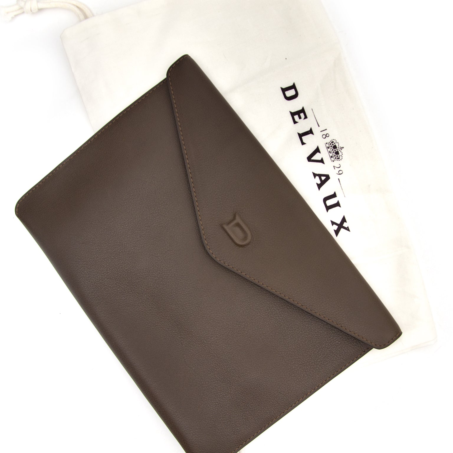 We buy and sell your Delvaux Taupe Enveloppe Clutch bag for the best prixe