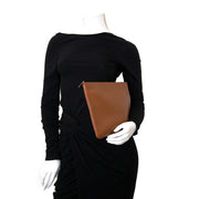 Delvaux Brown Leather Pochette Clutch for sale online at Labellov