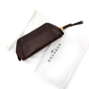 Buy your Delvaux Brown Bridon Leather Pochette preloved at Labellov