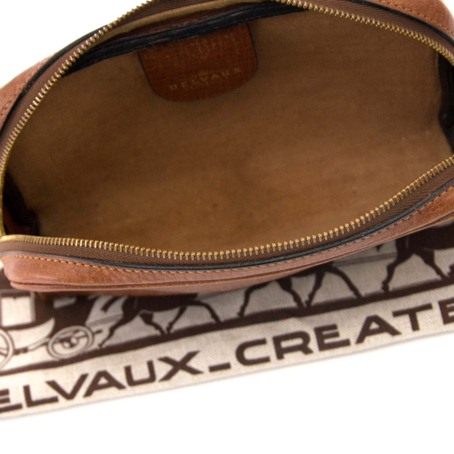 Are you interested in an authentic Delvaux Cognac Textured Leather Zip Pochette
