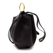 Compra une cartera Delvaux autentica vintage en monogramo de cuero muy en moda para el precio correcto en LabelLOV.