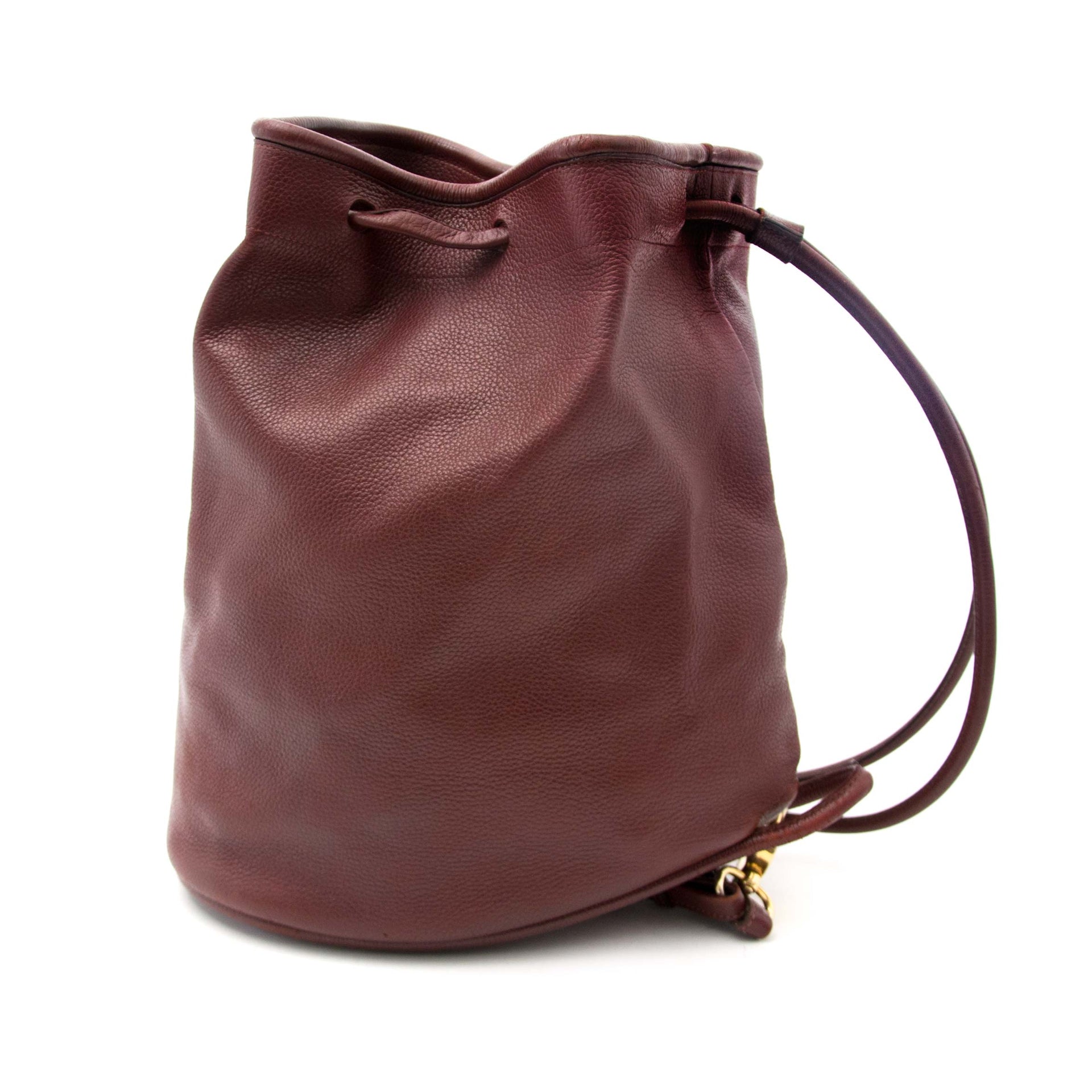 Buy your authentic Delvaux Bordeaux Drawstring Leather Bucket Bag