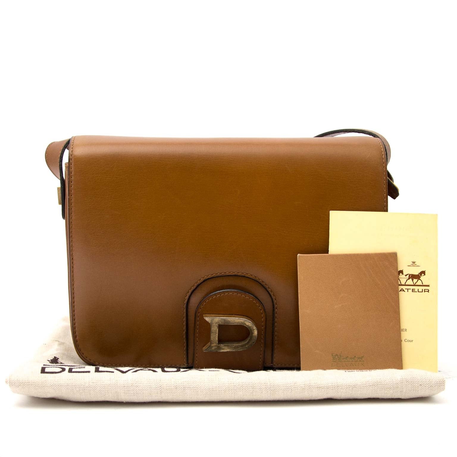 Delvaux Camel 'Heureux' Leather Saddle Flap Bag Buy authentic designer Chanel secondhand bags at Labellov at the best price. Safe and secure shopping. Koop tweedehands authentieke Chanel tassen bij designer webwinkel labellov.