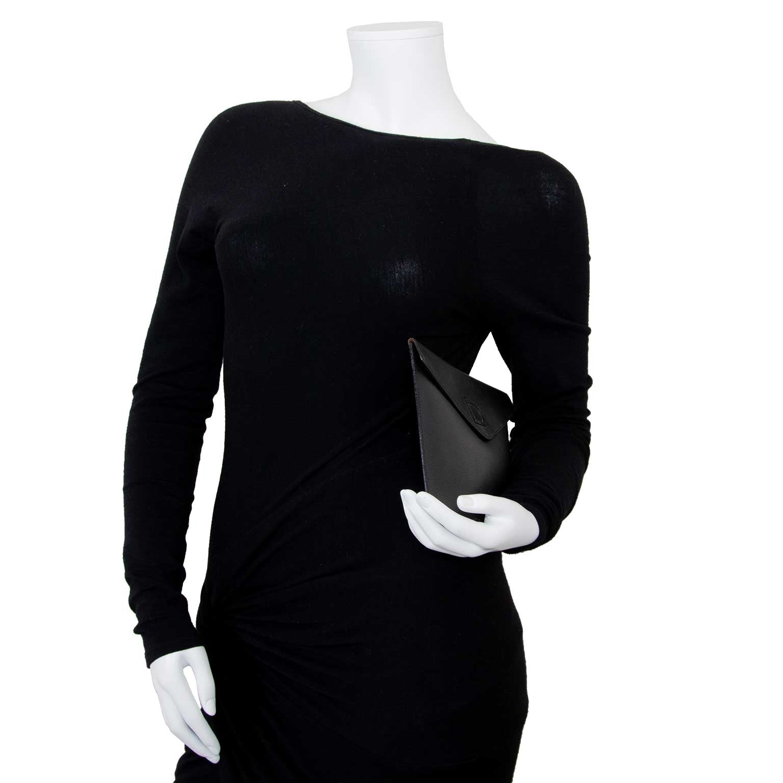 delvaux black pochette now for sale at labellov vintage fashion webshop for the lowest price