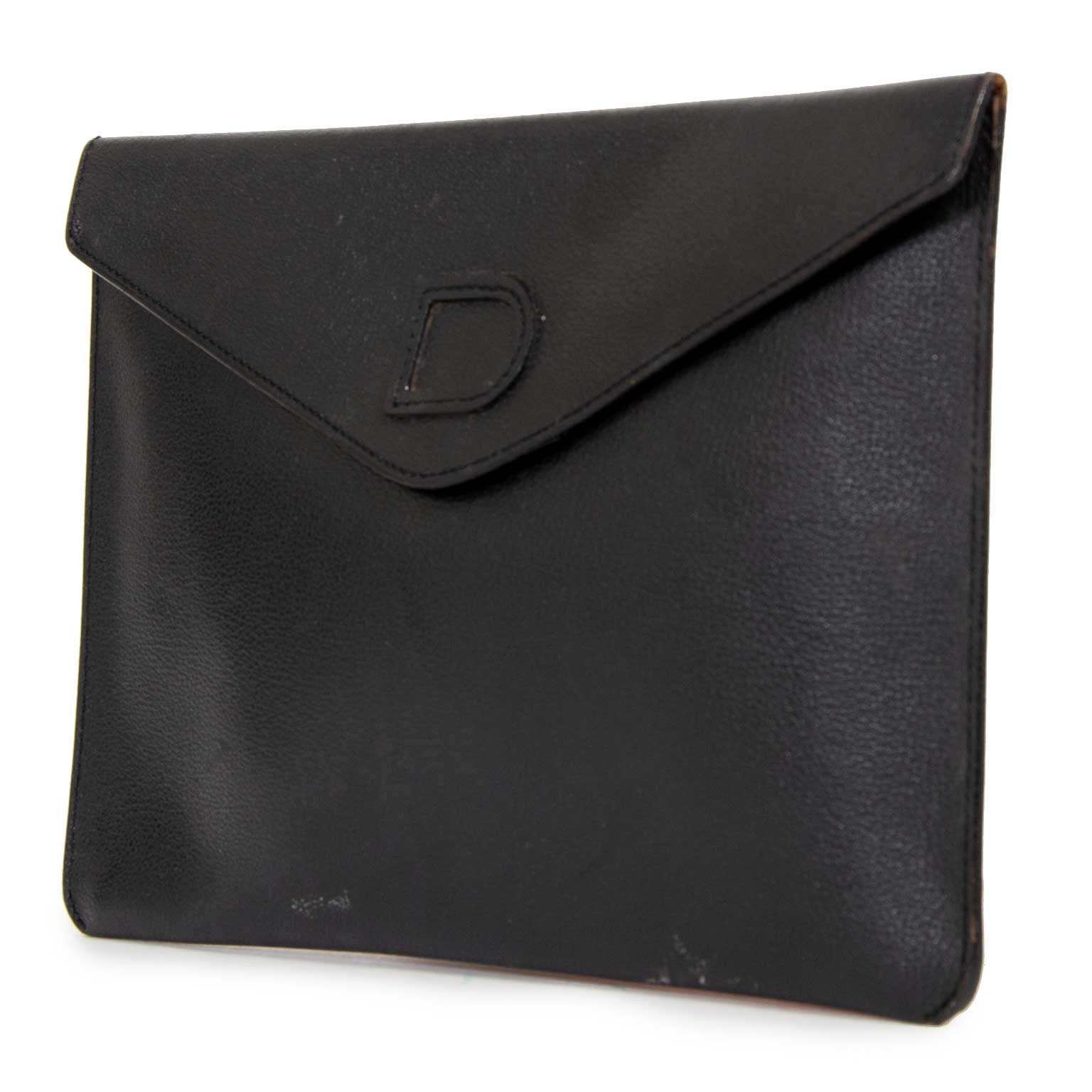 delvaux black pochette now for sale at labellov vintage fashion webshop for the lowest price